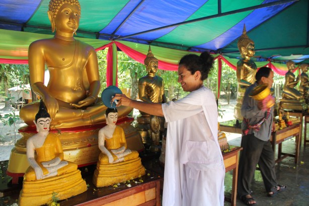 the cleaning of the Buddha